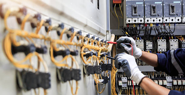 Professional Electrician technician working in Cedar Grove, FL